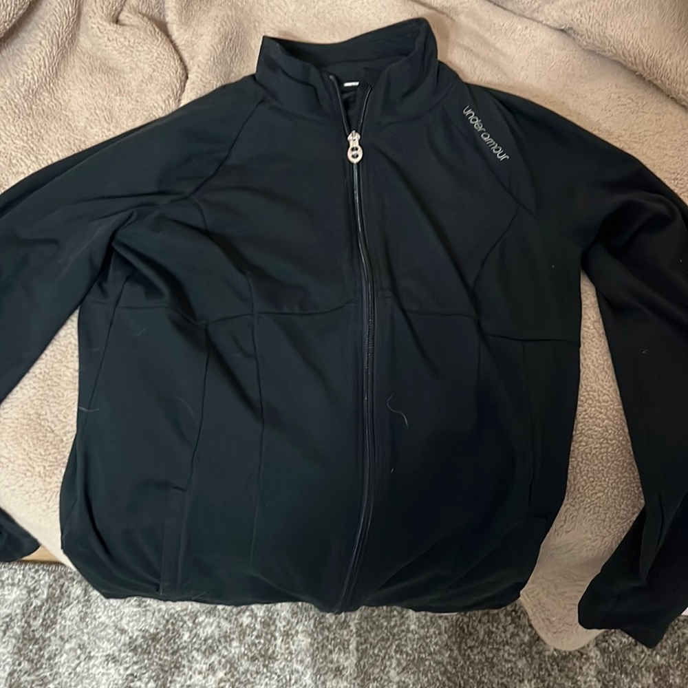 Womens black Under Armour full zip sweatshirt semi fitted.  82% polyester
